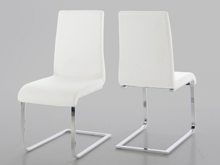 Bílé jídelní židle na pérové ​​konstrukci s chromovou podnoží